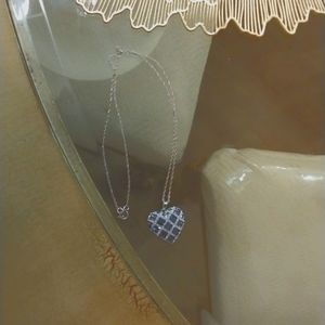 A deep blue heart necklace